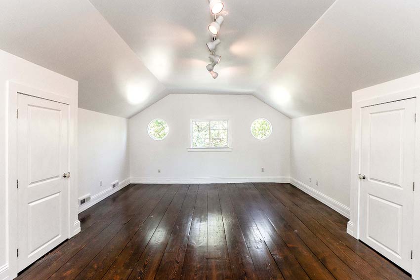 Open space on 3rd floor featuring round windows