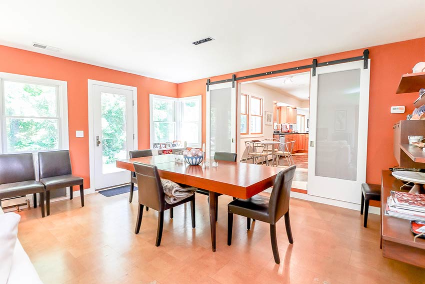 Dining room with sliding glass doors to kitchen.