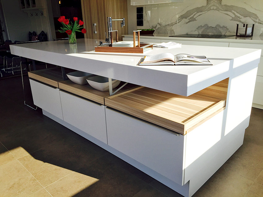 The 10ft Poggenpohl center island with their custom exclusive countertop system that will be the focal point of the kitchen
