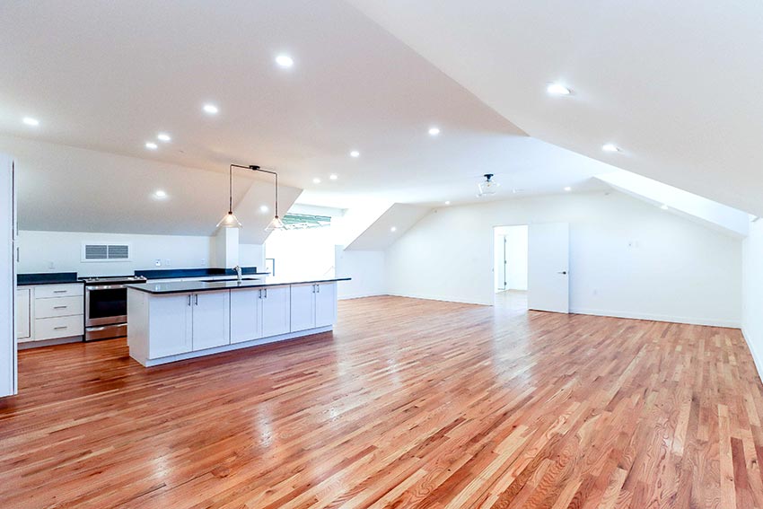 Open kitchen with hardwood floors.