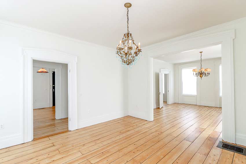 Front parlor view of hall and second parlor room.