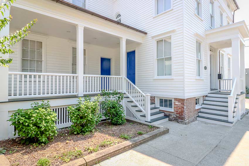 Front porch and main entrance to 34-36 S 2nd Street in Hudson, New York.