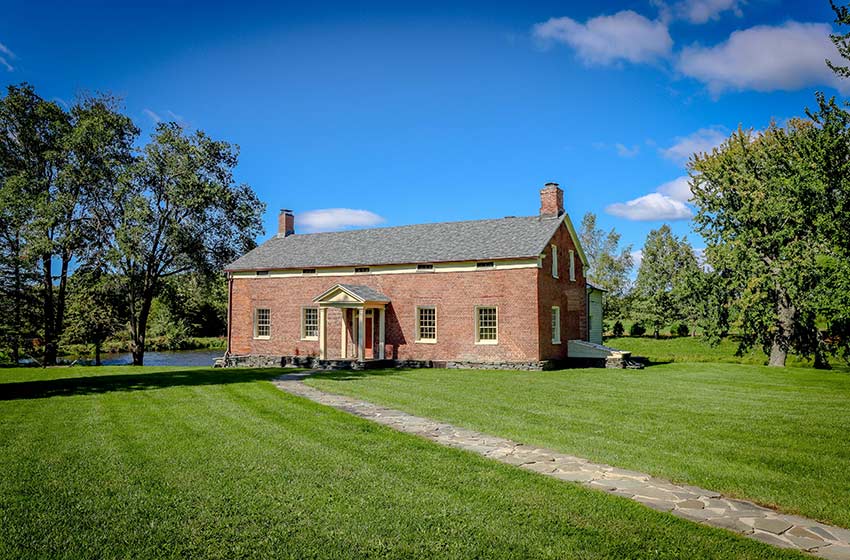 Front view of farmhouse at 342 Gilligan Road in Ghent, New York
