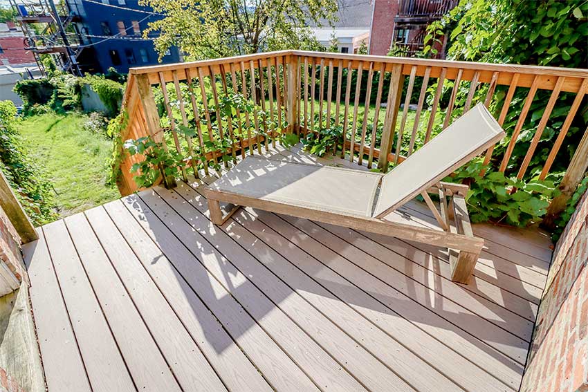 Outdoor deck with lounge chair