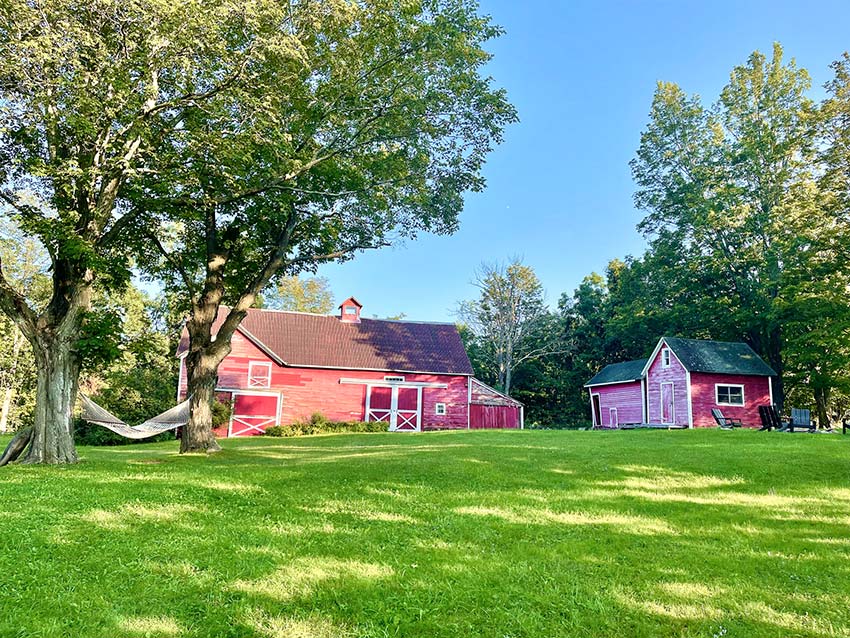 Two picturesque vintage red barns