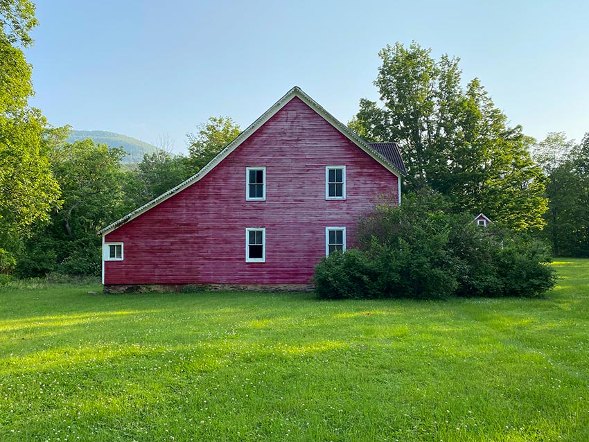 Red barn with view of Catskill Mountain Range