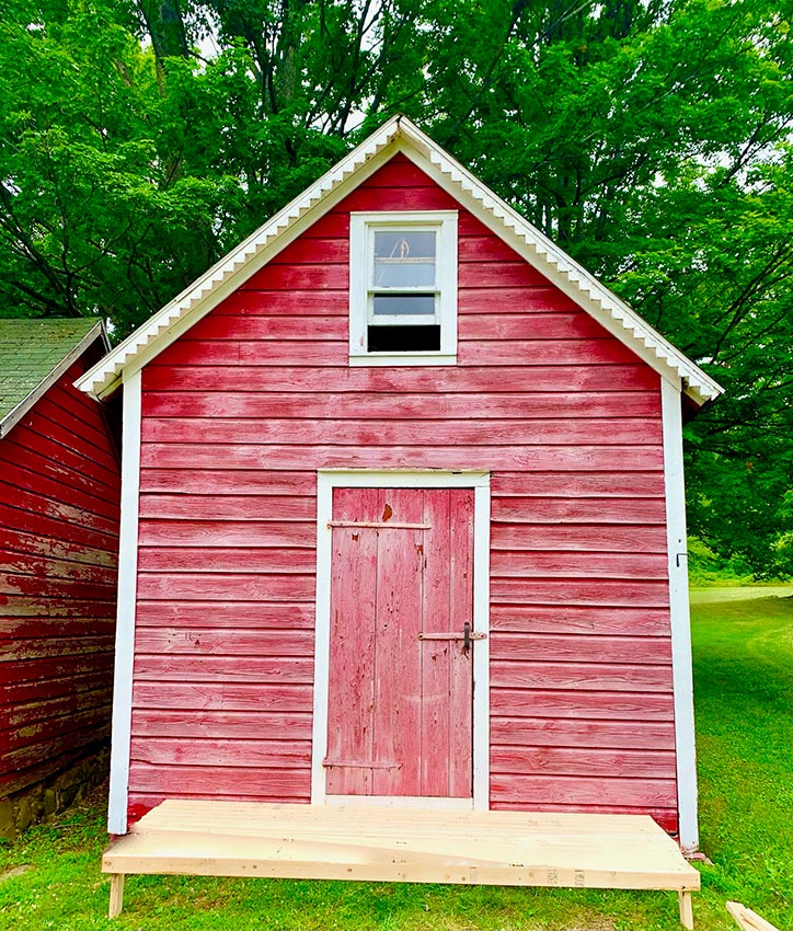 Small red barn on the property